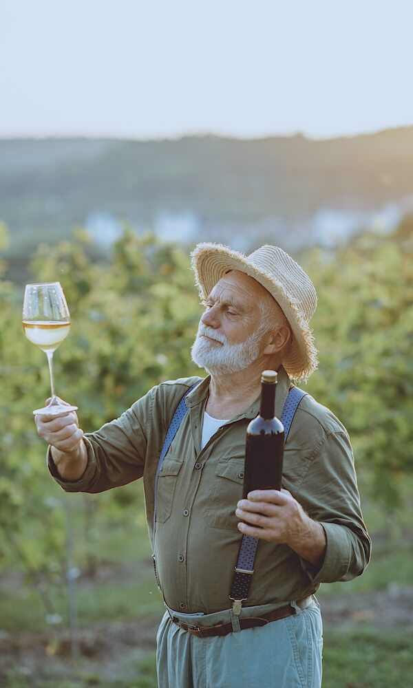 senior-winemaker-tasting-wine-on-the-vineyard